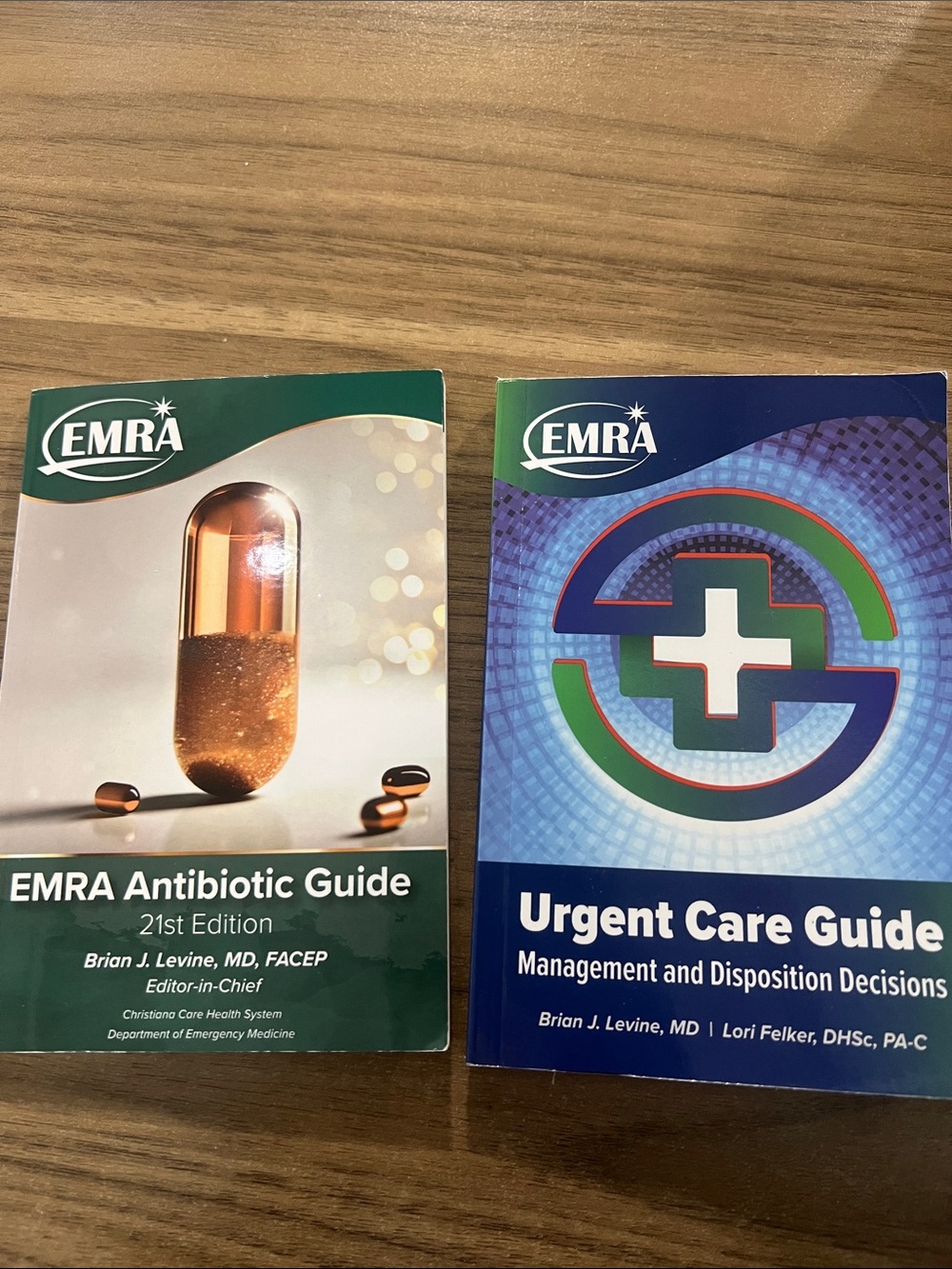 EMRA Antibiotic Guide & Urgent Care Guide Duo - Gently used